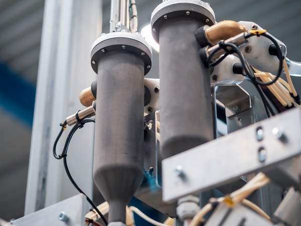 3D printed on the S2: two containers for a filling plant, a bending test rig, and a cover for machine elements.