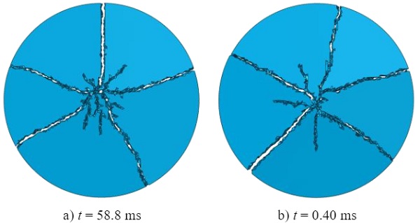 Fig. 11 Glass fragmentation (bottom view) for ring-on-ring test simulation with the *Brittle Cracking model for target piston velocities of a) 10 mm/s, and b) 1000 mm/s.