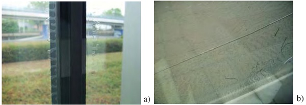 Figure 14 - Defect in IGU with laminated glass pane: a) defect starting from the glass pane edge; b) defect starting from a bubble