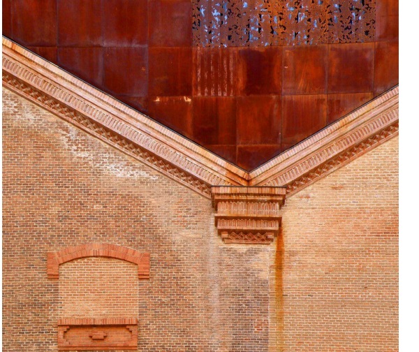 Figure 2b. The restoration of Caixaforum in Madrid (Spain) uses cast iron façade tiles to match the brick walls (CIRCARQ 2013).