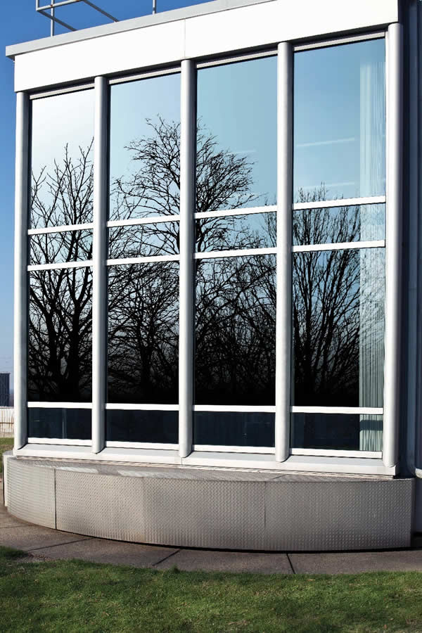 Solarban R77 glass unites a crisp, neutral, silver-blue aesthetic with building-code-friendly solar performance.