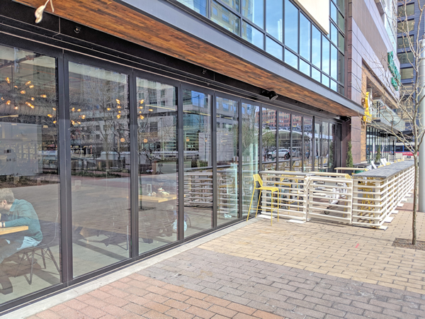 The lower level HSW60 system separates the eating area from the sidewalk.