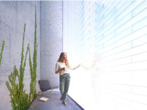 An entire wall of aerogel glass bricks brings daylight from outside into the interior - along with its positive effects on the occupants - and is still highly insulting. Image: Empa