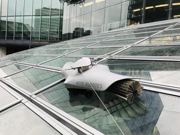 Window cleaning robot working at Utrecht Central Station