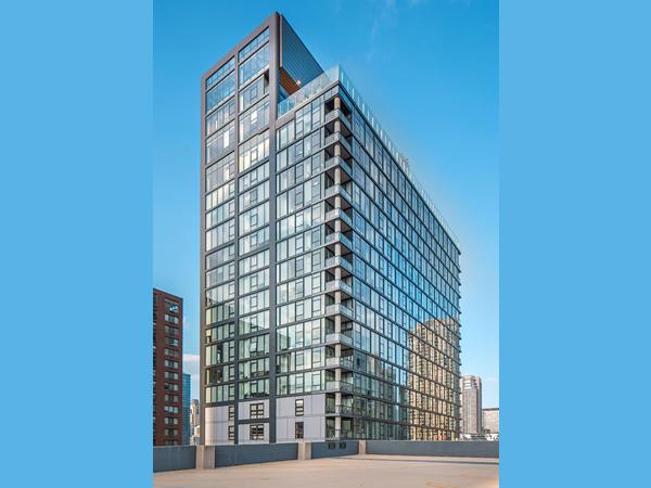 3Eleven is a 25-story residential tower in Chicago that features Solarban® 60 and Solarban® 60 Optigray® glass, part of the full range of Vitro architectural glasses to be renewed as Cradle to Cradle Certified™. Photography by Tom Kessler.