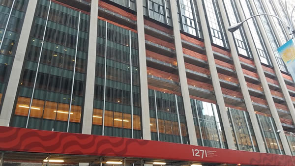 Transformation of old curtain wall to new on 1271 Avenue of the Americas.