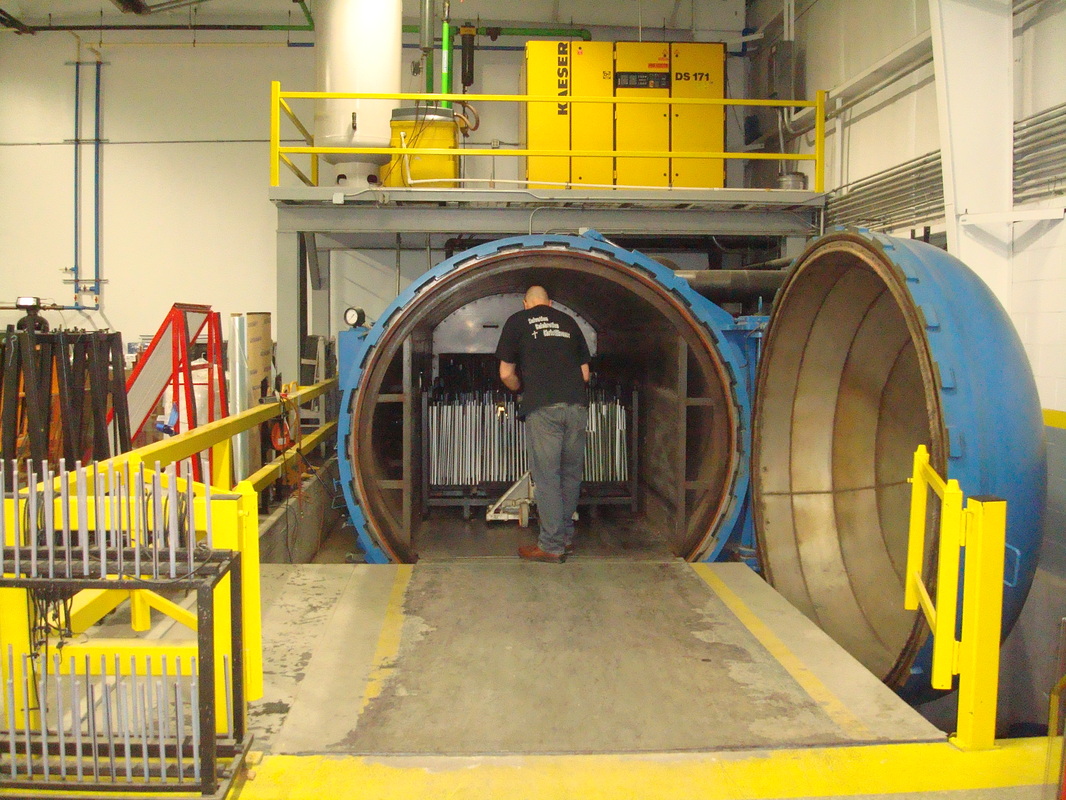 Thompson I.G.  has an autoclave that is able to make glass laminates up to 72” x 140”