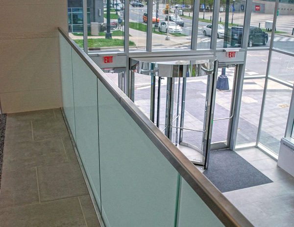 On the landing and overlooks, TCP’s Track Rail with 1/2” frosted laminated glass adds additional stability, and a stainless steel U-Channel top rail enhances the building’s modern aesthetic.