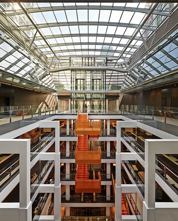 The atrium and its interconnecting stairs create an open and collaborative workspace.