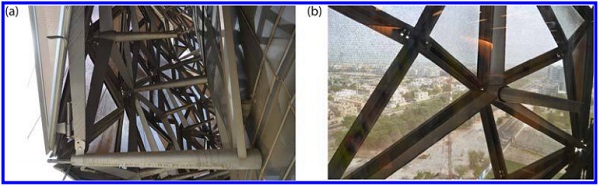 Figure 4. (a) A close view of the mashrabiya and curtain wall where the strut sleeves penetrate the curtain wall and connect to the main structure and (b) a view out when the mashrabiya is open (photo courtesy: Terry Boake).