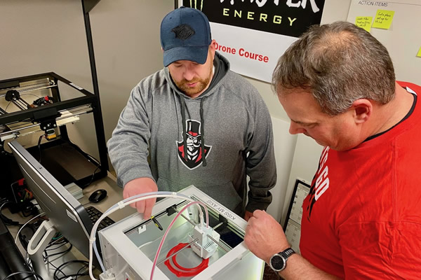 Ben Meisch, left, APSU Geographic Information Systems (GIS) volunteer confers with Doug Catellier, GIS project manager. Photo courtesy of APSU