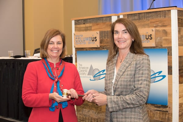Outgoing ACerS president Dana Goski, left, hands the ceramic gavel to incoming ACerS president Beth Dickey during the Annual Business Meeting on Oct. 18, 2021. Credit: ACerS