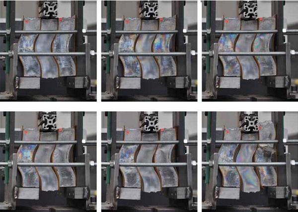 Figure 11 Polarized pictures of Test 1, showing the increase of the stresses developed in the glass 