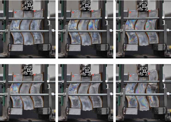 Figure 11 Polarized pictures of Test 1, showing the increase of the stresses developed in the glass