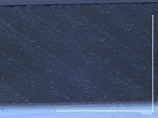 Fig. 11: Arris seen with angled reflected lighting , magnification 200X.
