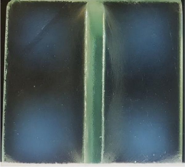 Fig. 12 Typical image of the fused specimen's flange, made with polarizing filters to show residual stress.
