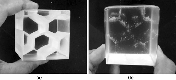 Fig. 13 Kiln-cast experiments with Schott DURAN borosilicate rods of 24mm diameter forming 50mm cubic samples. a Crystallized hexagon structure, engineered at 970 ◦C. b Bubble-veil hexagon structure engineered at 1120 ◦C