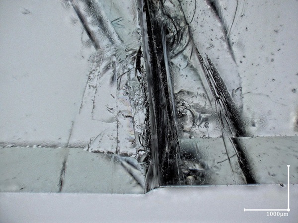 Fig. 15: Fracture initiation point with transmitted lighting, 50X, 2D image produced from 3D picture, no clear details visible.
