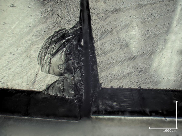 Fig. 17: Fracture initiation point with angled reflected lighting, 50X, 2D image produced from 3D picture, fracture origin unclear.