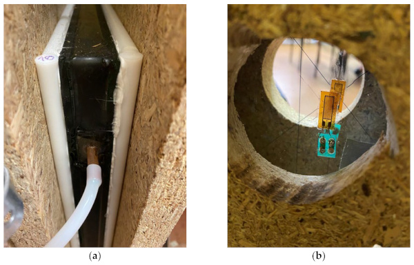 Figure 1. Details of the test stand: (a) mechanical supports and silicone conduits for gas exchange in the gap; (b) strain gauges mounted to the panes.