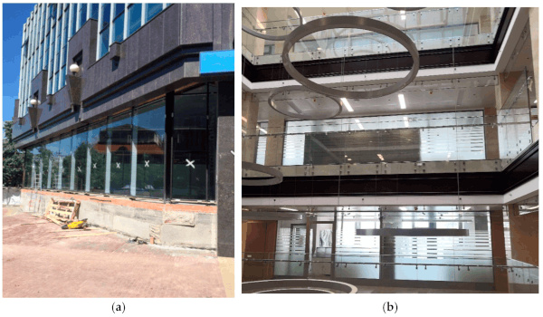 Figure 1. Business center “Chelyabinsk City”: (a) facade and (b) smoke-proof all-glass screen in the atrium. Photo by the authors.