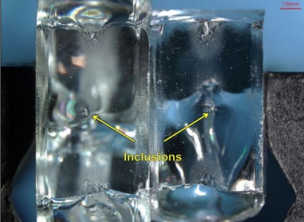 Fig. 1: Mating inclusions in the glass fragments.