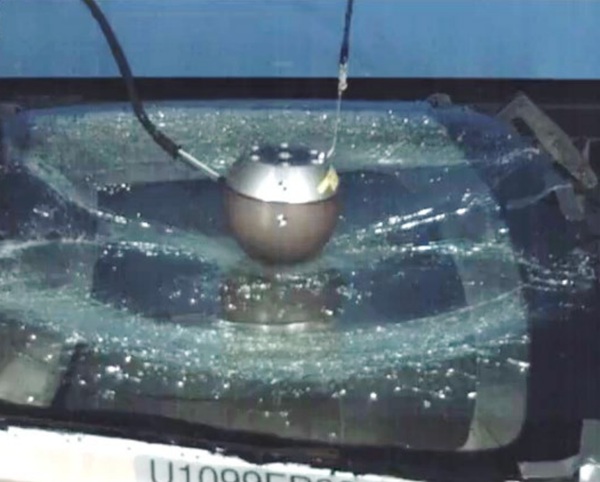 Fig. 1: Full size impact test on windshield.