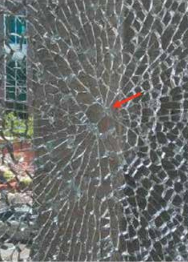 Figure 1. View of shattered glass indicating butterfly pattern.