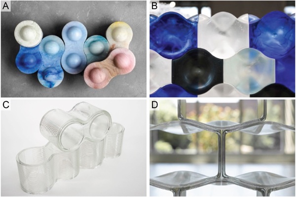 Fig. 1: Cast (A and B) and additively manufactured (C and D) interlocking glass bricks following similar geometries developed by TU Delft and MIT & Evenline respectively.