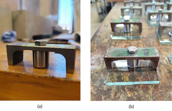 Fig. 2: Alignment bridge used during specimen preparation to ensure concentric dolly positioning and to control the nominal adhesive layer thickness (0.3 mm).