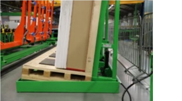 Fig. 3: Hydraulic crate tilter capable of various tilt angles.