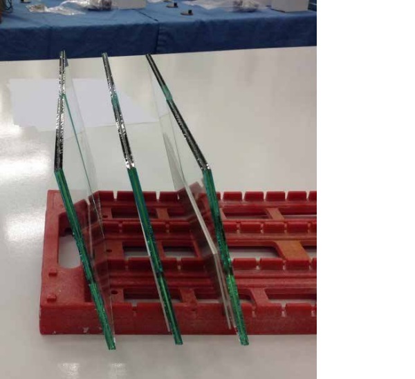 Figure 4: Laminated glass in exposure rack for Salt Fog testing