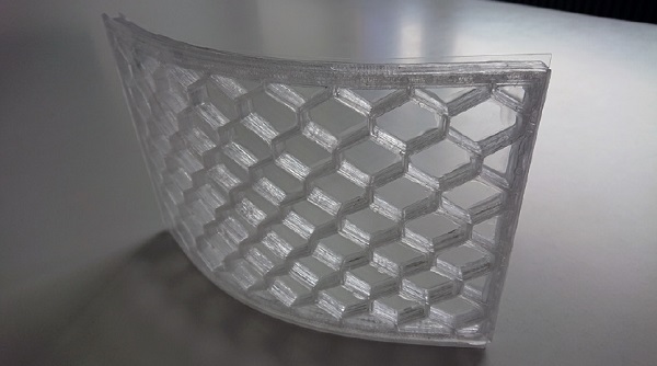 Figure 6: Curved thin glass composite panel with 3D-printed pattern, developed in the thesis of Charbel Saleh.