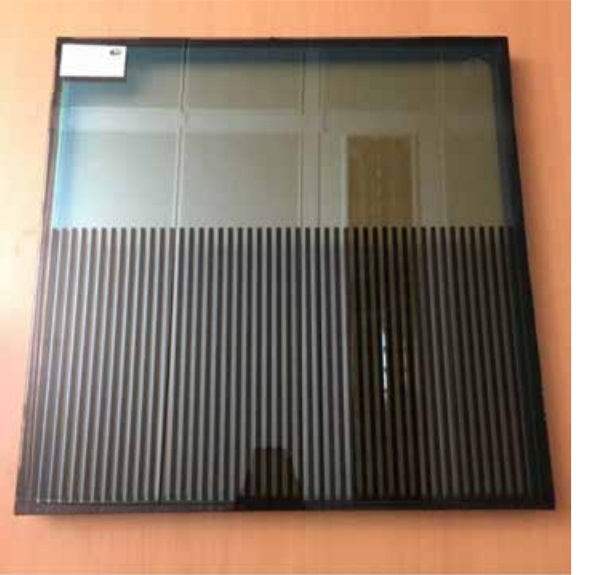 Figure 7.1: Glass Sample of 5% fritting, 5 mm vertical black stripes. Guardian SNX 50/23. (Denton Corker Marshall, London)