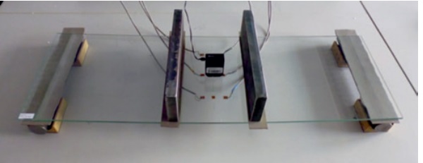 Figure 7: Experimental setup for the determination of the photoelastic constant