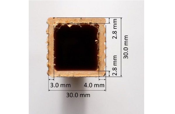 Fig. 8: Cross-section dimensions of the GFRP profile. The side walls were ridged on the outside, so both the thickness measured in the troughs (left) and at the peaks (right) are shown.