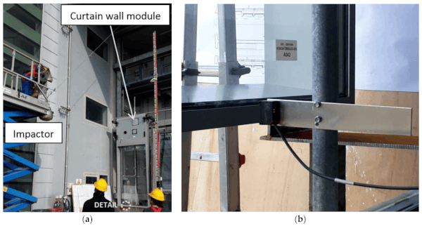 Figure 8. Impact experimental test with spheroconical bag: (a) tested curtain wall panel and (b) detail view of one of the laser sensors in use (bottom transom).