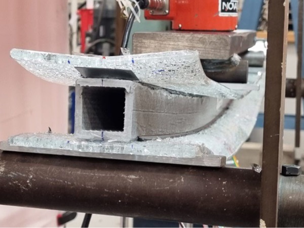 Fig. 9: Horizontal shear failure along the top face of the GFRP core (specimen C1).