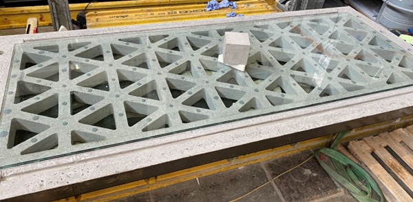 Fig. 9: Bottom glass plate of the hybrid floor panel, bonded using point fixings.