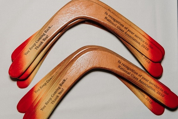 Engraved boomerangs were presented to member volunteers who keep “returning” to participate in technical task groups.