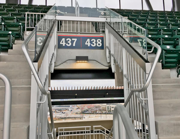 Classic Picket railing topped with our Track Rail glass system at fan seating entrances