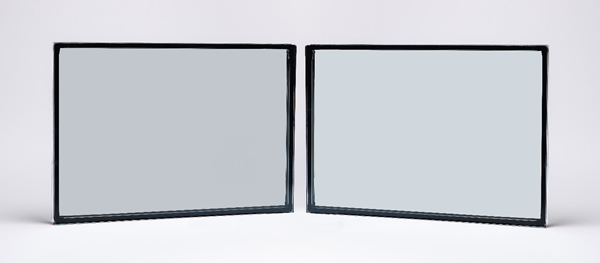 Solarban R77 glass, a new solar control, low-emissivity (low-e) glass by Vitro Architectural Glass, can be coated on conventional clear glass (left), Acuity low-iron glass (right), Starphire Ultra-Clear glass and Vitro Glass’s entire line of tinted glasses.