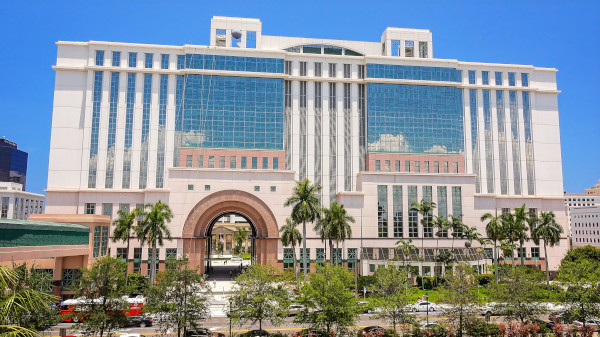 The Judicial Center and Courthouse, West Palm Beach, FL is an example of a 12-story building renovation where the existing façade frames were modified to incorporate new large missile glazing. (Copyright: full rights Image©CrackerClips Stock Media / Alamy)