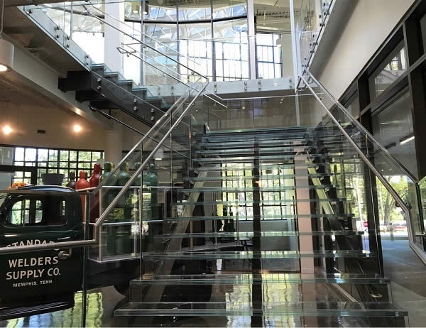 The client wanted the illusion of invisible treads. Working on a tight schedule, Trex Commercial Products achieved the client’s vision with its Point Series railing system and glass treads, for a seamless, nearly invisible look.