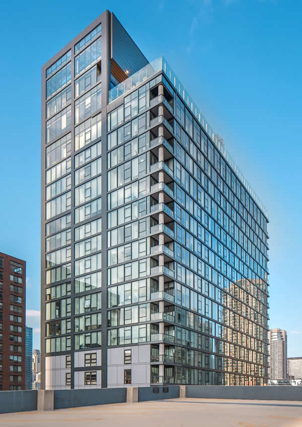 3Eleven is a 25-story residential tower in Chicago that features Solarban® 60 and Solarban® 60 Optigray® glass, part of the full range of Vitro architectural glasses to be renewed as Cradle to Cradle Certified™. Photography by Tom Kessler.