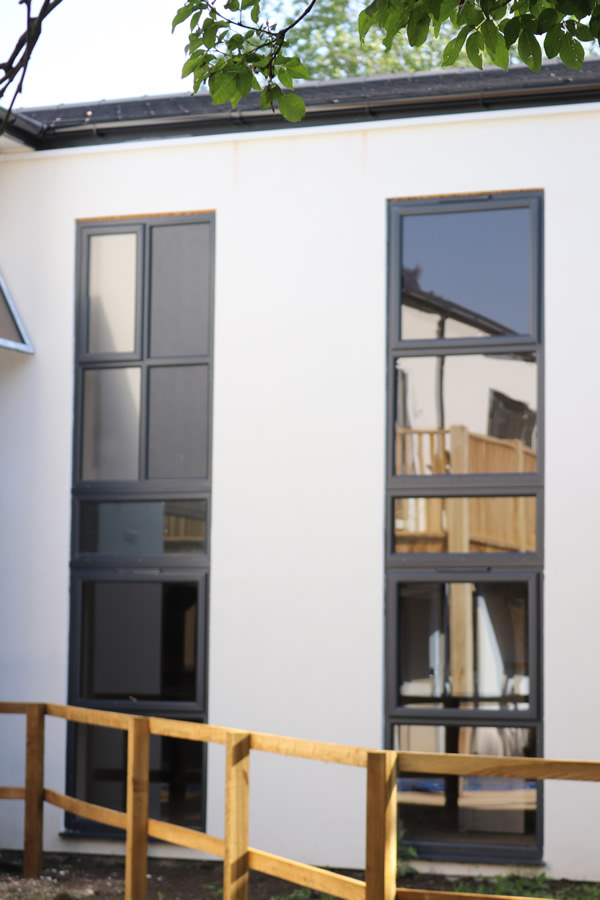 aluplast’s Ideal 70 in anthracite grey used to good-effect by DGlass and Jones Building Group in a conversion of a former Marlborough nursing home