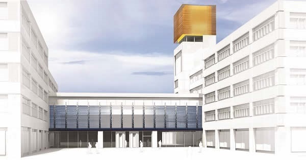 Two characteristic elements and the material glass make the new building of Cambridge Assessment a landmark. Together with the tower, the backlit glass façade out of orange-colored laminates form an architectural accent that is visible for miles around. The blue printed IGUs of the Skywalk link two wings and are a visual counterpart of the tower. Photo: sedak GmbH & Co. KG