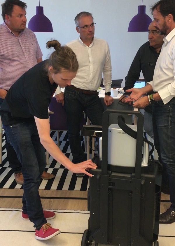 Ville-Petteri Säily (Sparklike's Production Manager) giving hands-on  training for Sparklike Laser Portable device to Tecnovati's Mr. Leonardo Ghizzani,  Mr. Mauro Pasqualetti and Mr. Fulvio Monaci.