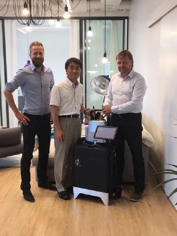Correns Corporation's Mr. Yasuhiko Kojima with Sparklike's CEO  Mr. Miikkael Niemi and Sales Director Mauri Saksala
