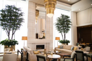 Giroux Glass installed the large mirror behind the grand bronze chandelier in the Lobby Lounge.